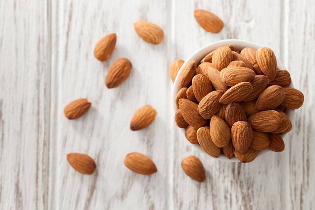 Almond Nut Organic Healthy Snack Vegan Vegetarian White Backgrou