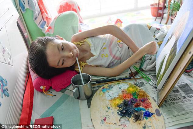 The devoted artist only stops from time to time to take a sip of water placed on her bedside