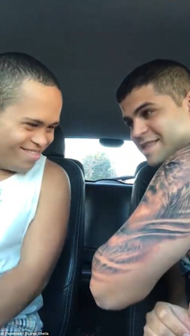 The man showed his younger brother who has Down syndrome his new tattoo for the first time